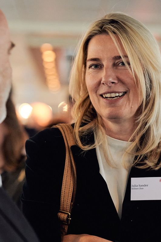 Zwei Gäste im Gespräch auf dem Networking Event